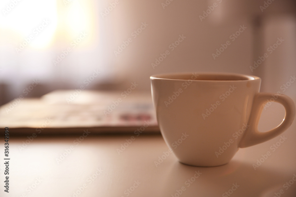 Cup of tasty drink on table, space for text. Lazy morning - obrazy, fototapety, plakaty 