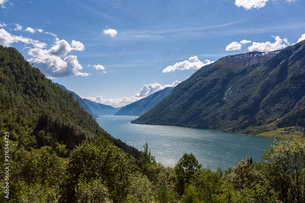 View to mountains and fjord in summer day, Norway