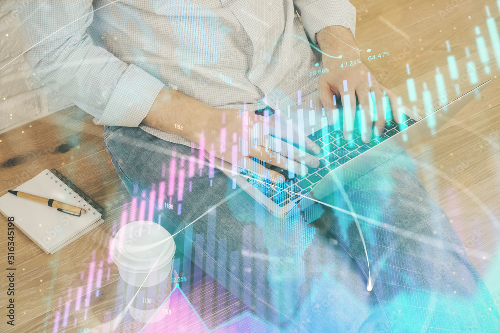Forex graph with businessman working on computer in office on background. Concept of analysis. Double exposure. Forex graph with businessman working on computer in office on background. Concept of analysis. Double exposure.