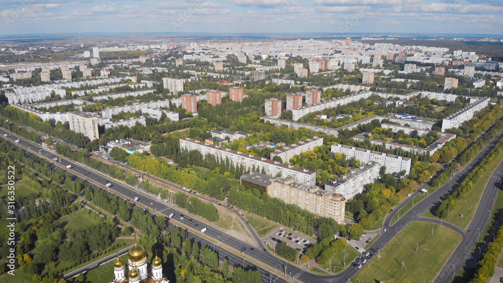 Aerial view. The city is a garden designed during the time of socialism. Large spaces and magnificent avenues, panel boxes of doi and lots of greenery. Tolyatti in the Samara region.