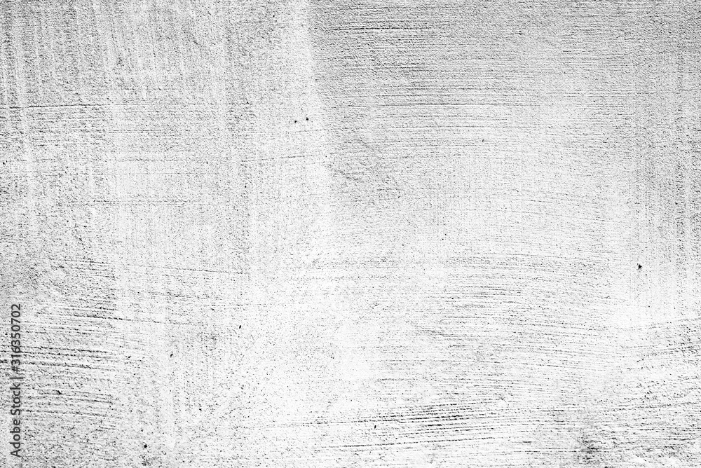 Texture of a concrete wall with cracks and scratches which can be used as a background Texture of a concrete wall with cracks and scratches which can be used as a background