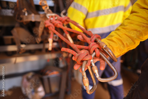 Safe work practices rope access safety inspector pre operation double checking alpine butterfly knot equipment ensure are fasten correctly prior starting each shut down construction site Sydney 