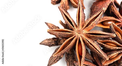 Group of star anise spice isolated on white background, top view