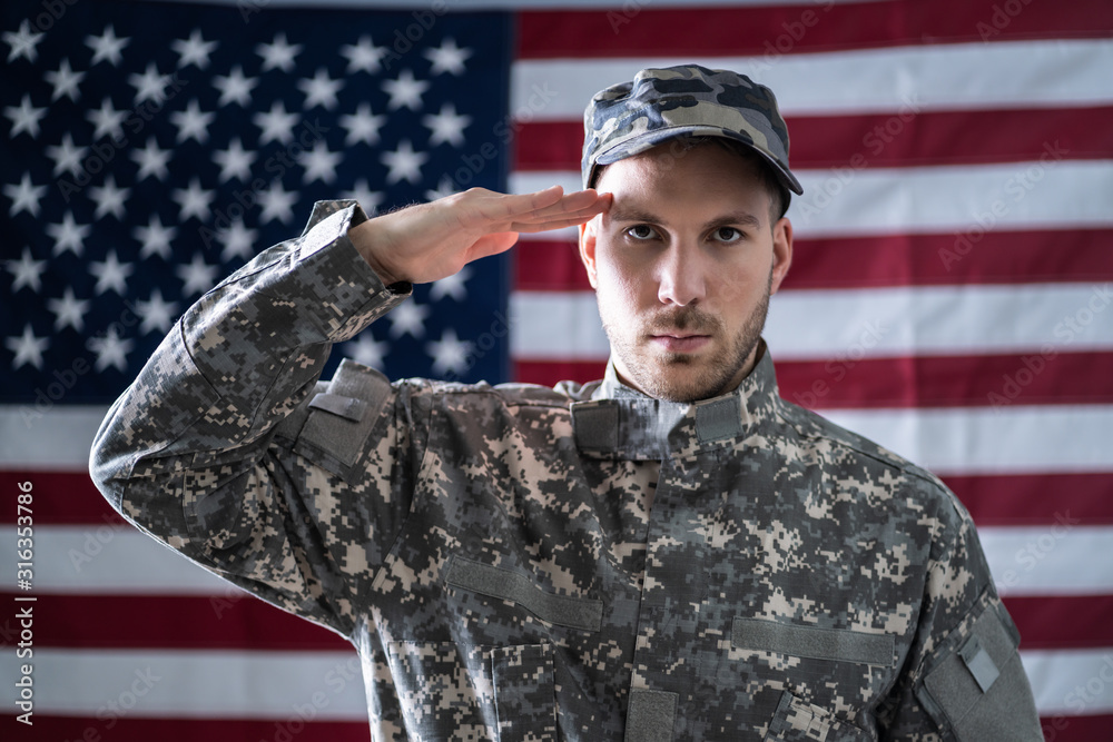 Army Soldier Saluting In Front Of American Flag Army Soldier Saluting In Front Of American Flag
