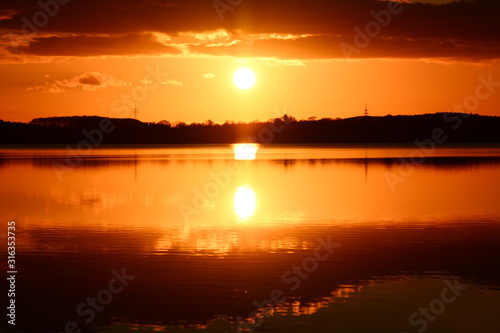 sunset over lake © Stephan