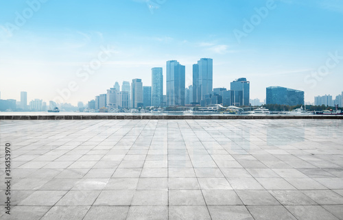 Panoramic skyline and buildings with empty concrete square floor,shanghai,china