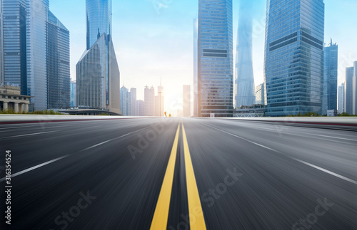 Dynamic blurry highway and city skyline in Shanghai, China