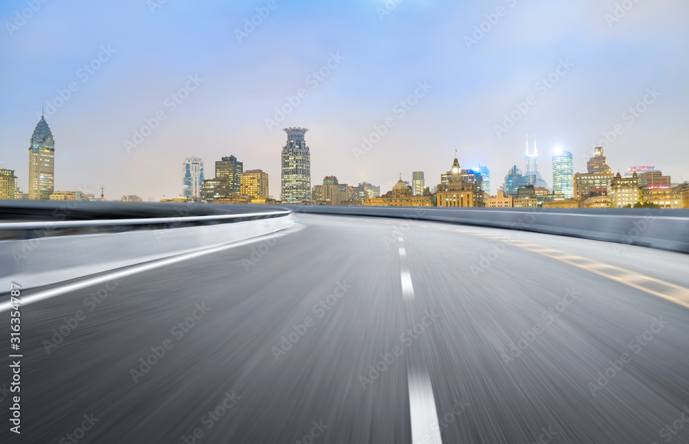 Dynamic blurry highway and city skyline in Shanghai, China