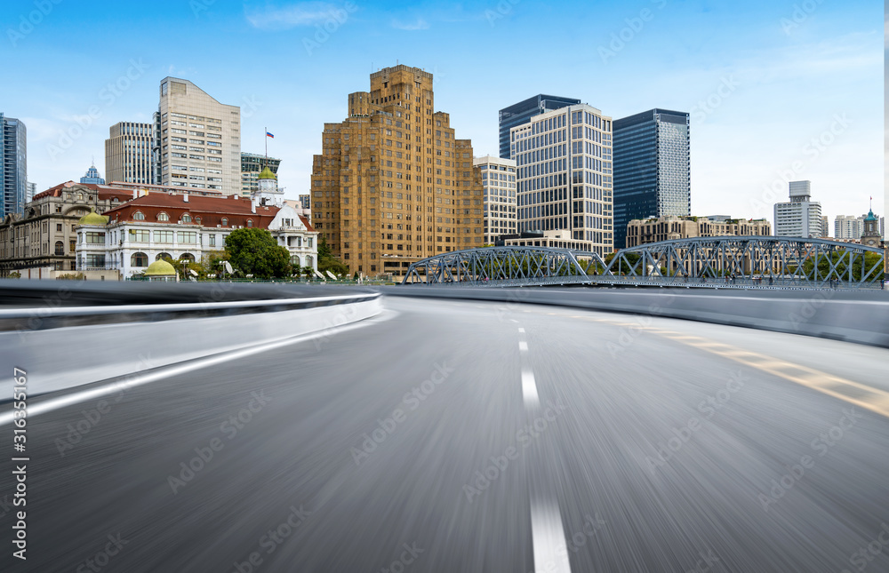 Dynamic blurry highway and city skyline in Shanghai, China