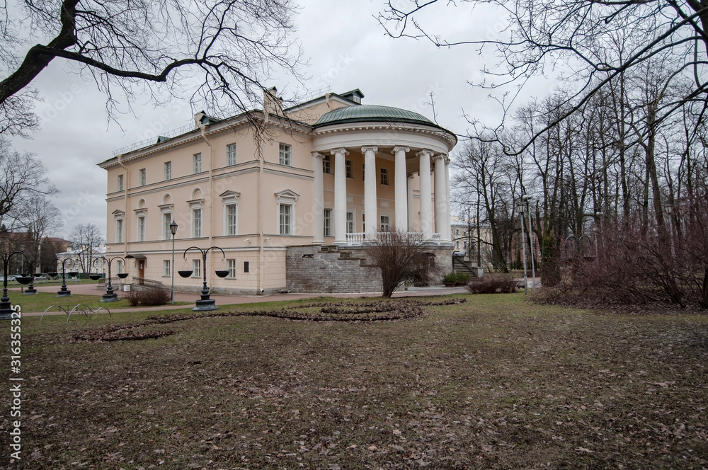 The building of the wedding palace in the city autumn park