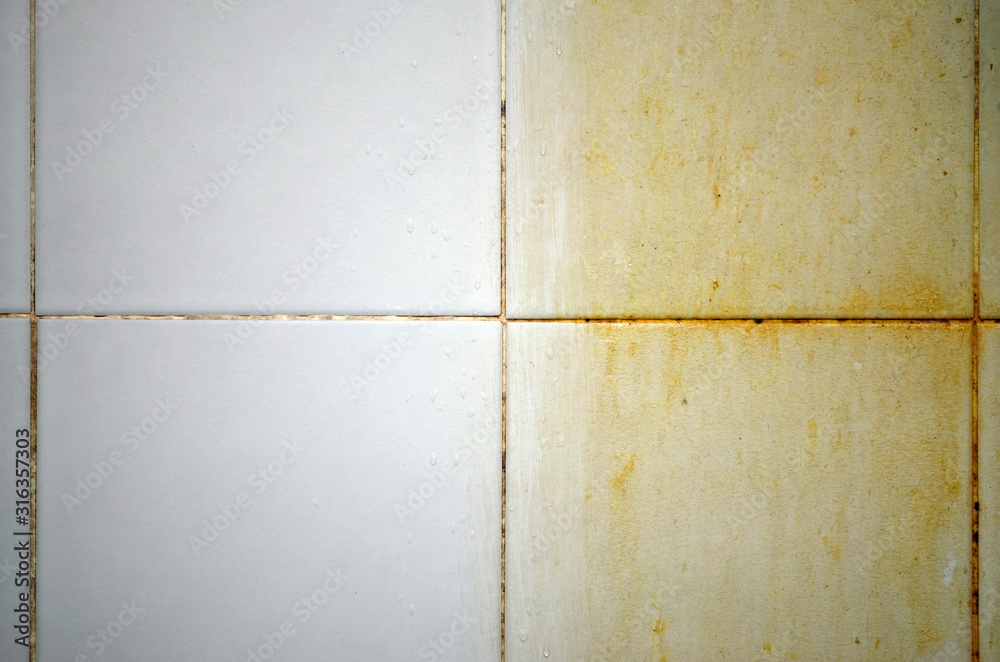 Before and after cleaning dirt tile on floors, walls, and corners of