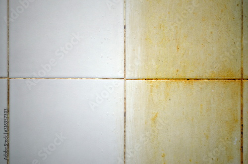 Before and after cleaning dirt tile on floors, walls, and corners of the bathroom Fototapet