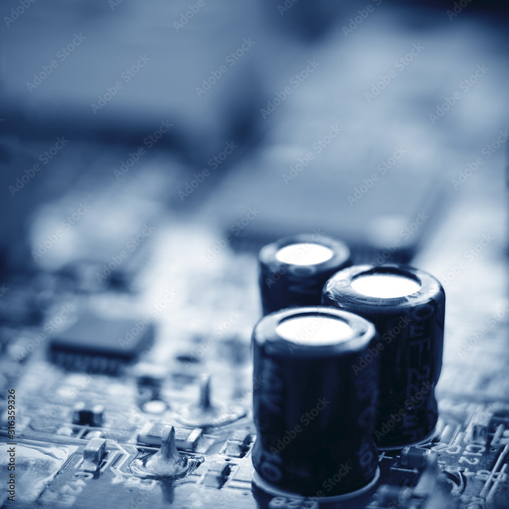 Circuit board in blur. Blurry image of a circuit board. Circuit board in blur. Blurry image of a circuit board.