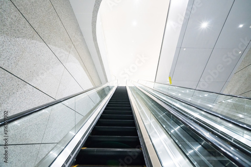 modern escalator in shopping center