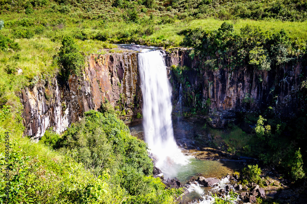 Obraz premium The Sterkspruit waterfall near Monks Cowl in the Kwazulu-Natal Drakensberg, South Africa
