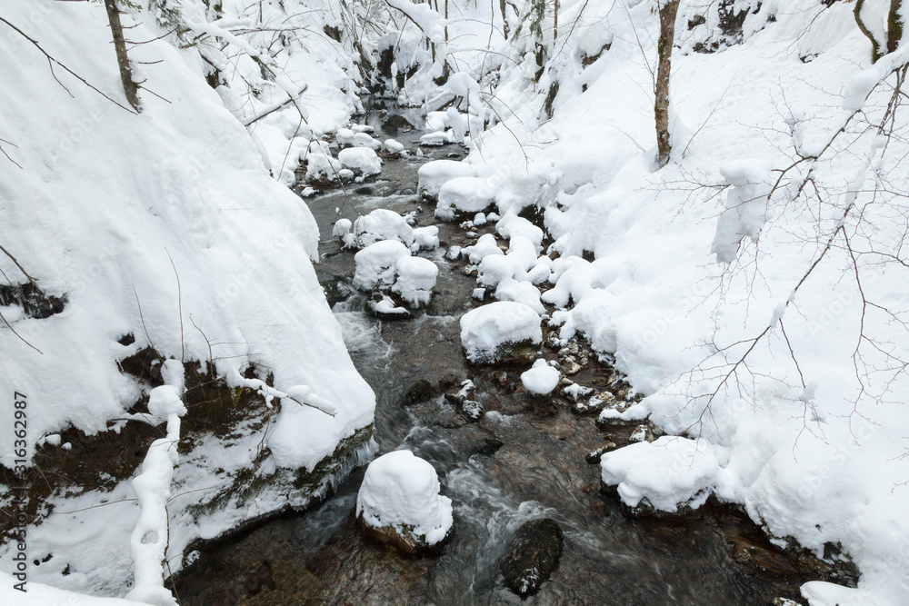The Kamacnik River covered in deep snow, Croatia The Kamacnik River covered in deep snow, Croatia