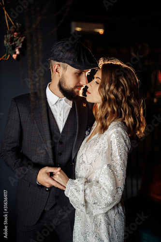 Amazing elegant wedding couple in the restaurant