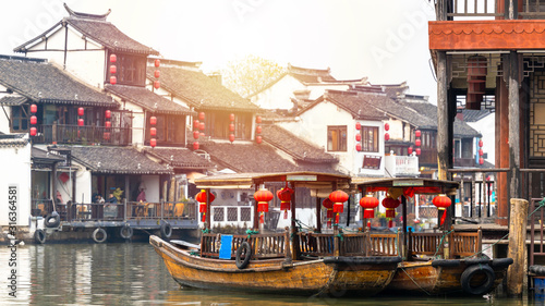 Photography Zhujiajiao Water Town and China traditional tourist boats on canals of Shanghai Zhujiajiao Water Town in Shanghai, China