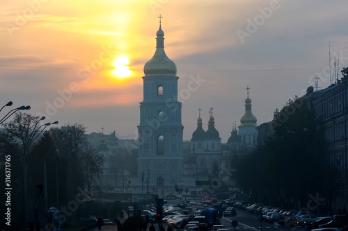 Sunrise over the Sofia Square in Kyiv  Ukraine. St. Sophia Cathedral and monument to Bogdan Khmelnytsky. August 2008