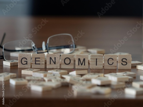 genomics concept represented by wooden letter tiles photo