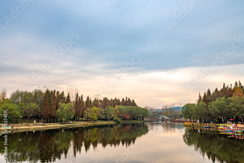 Lake and reflection in cloudy sky park