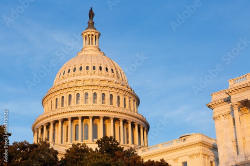 Washington DC Capitol golden light with blue sky background
