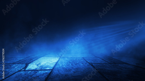 Empty background scene. Spotlight light reflection on asphalt. Rays of neon light in the dark, neon shapes, smoke. Background of an empty stage show. Abstract blue dark background.