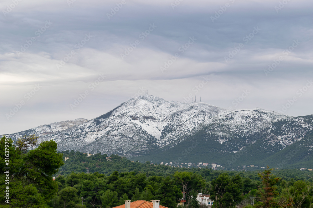 Penteli mountain from Dionysos side, with peak covered in snow