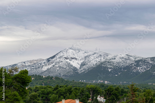 Penteli mountain from Dionysos side, with peak covered in snow