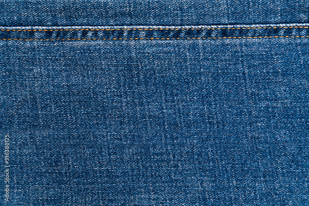 Detail of nice blue jeans textile tuxture for background with vintage tone. Detail of nice blue jeans textile tuxture for background with vintage tone.