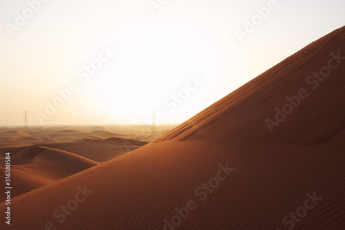 Sunrise in the red desert sand dunes of the Arabian Desert in Riyadh  Saudi Arabia