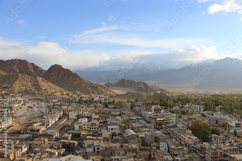 panoramic view of the city with mountain background