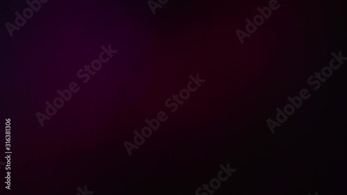 Abstract slow motion of light lens flare effect with light pulses or light leak on black background. Motion for creative transition, adding background on videos.