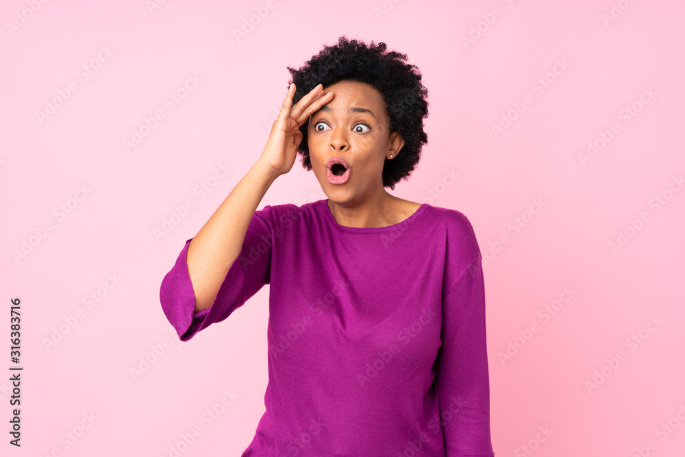 African american woman over isolated pink background has just realized something and has intending the solution African american woman over isolated pink background has just realized something and has intending the solution
