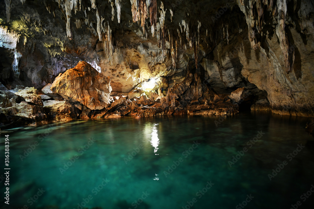 Fototapeta premium cave with underground lake on a tropical island in the philippines