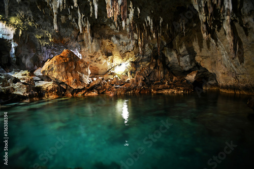 cave with underground lake on a tropical island in the philippines