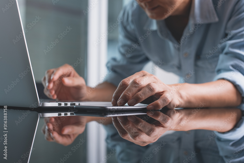 Working on laptop computer