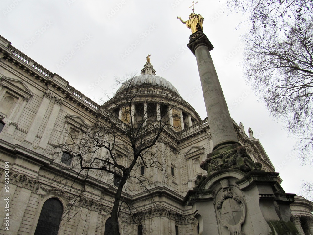The statue of St. Paul located at the gardens of Saint Paul's Cathedral in London 