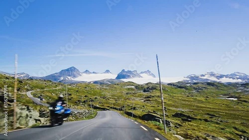 Driving scenic route Sognefjellet linking he coast and inland areas from Lom, Boverdalen to Gaupne in Western Norway photo