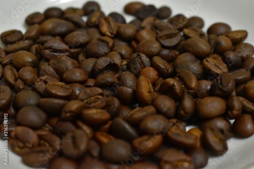 Roasted coffee beans on a substrate.