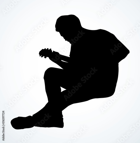 A man plays the guitar. Vector drawing