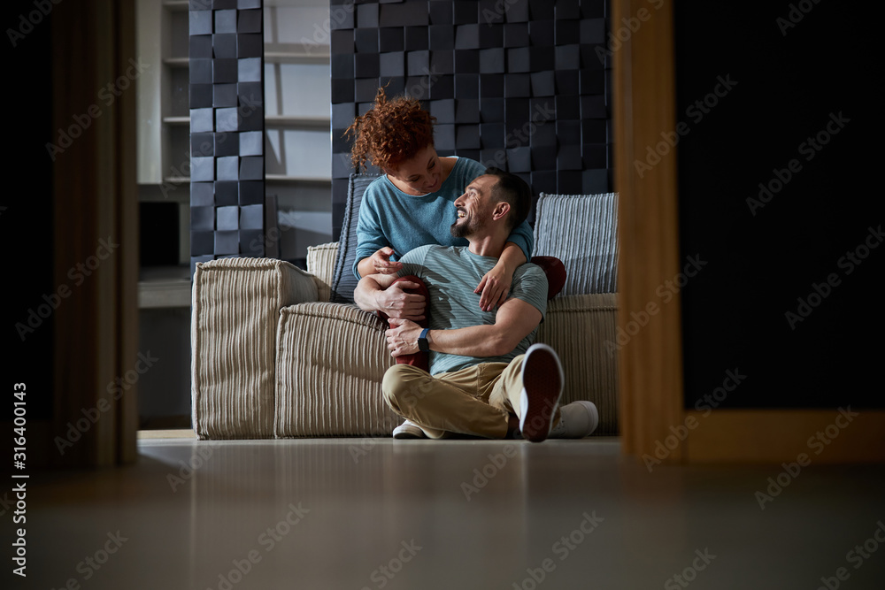 Happy spouces having good time at home stock photo Happy spouces having good time at home stock photo