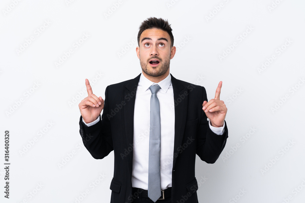 Young business man over isolated background pointing with the index finger a great idea Young business man over isolated background pointing with the index finger a great idea
