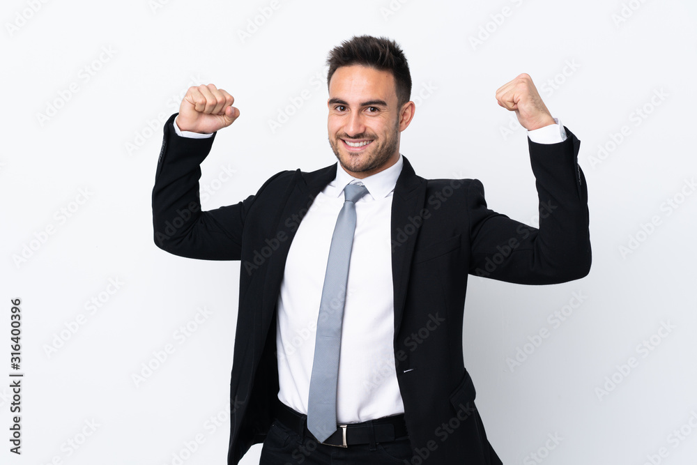 Young business man over isolated background celebrating a victory Young business man over isolated background celebrating a victory