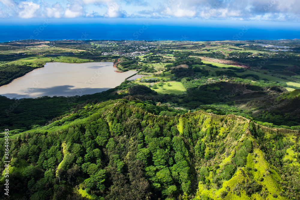 Aerial view of Kauai's lush colorful southern coast around Poipu.