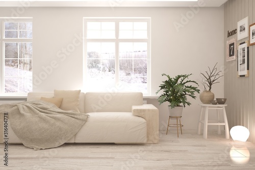 Stylish room in white color with sofa and winter landscape in window. Scandinavian interior design. 3D illustration © AntonSh