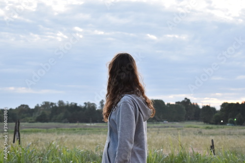 young woman in wheat field