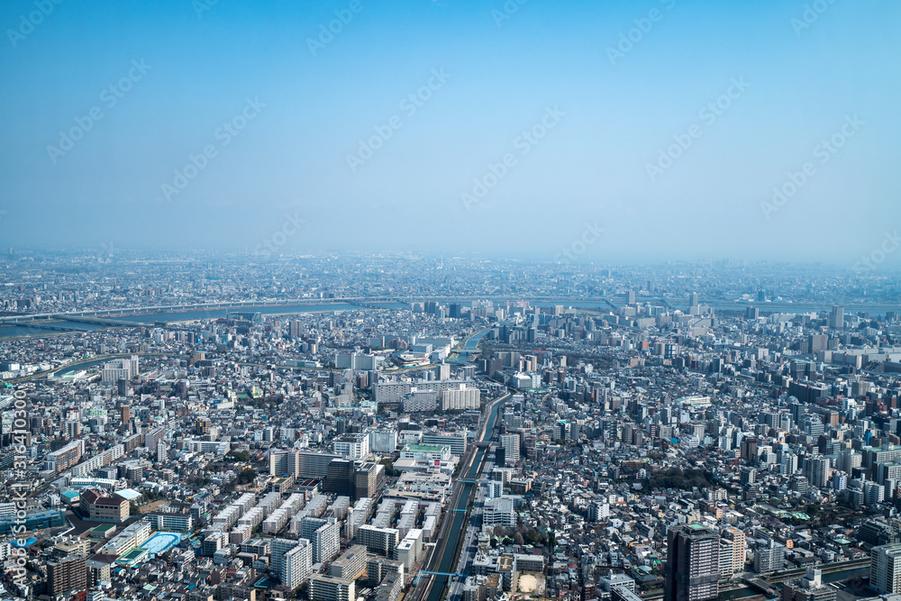 Asia business concept for real estate and corporate construction - panoramic urban city skyline aerial view under sky in tokyo, Japan
