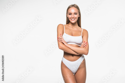 Photography Young woman with beautiful slim perfect body in white bikini isolated white back