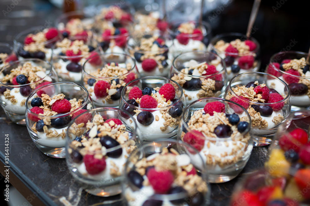 Desserts with fresh fruit and yochert at an event